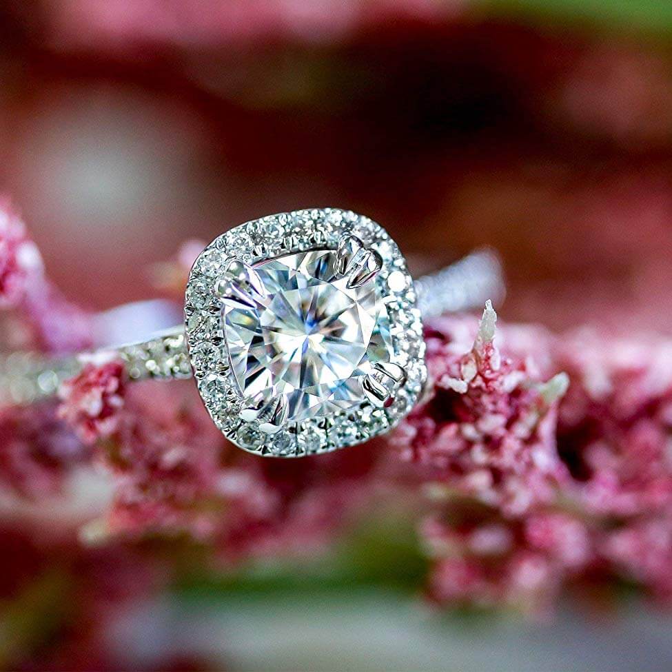 Lab Grown Diamond Halo Engagement Ring with flowers in the background