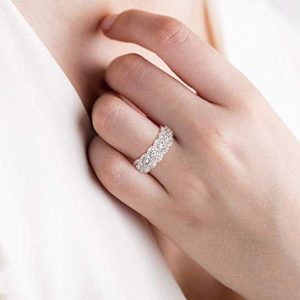 Female hand wearing Lab-Created Wedding Diamond Ring