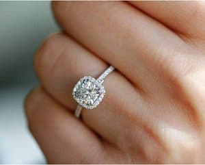 female wearing Lab Grown Diamond Halo Engagement Ring